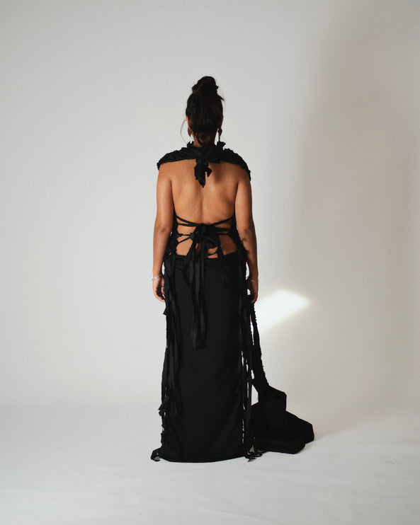 back of the woven dress of the model